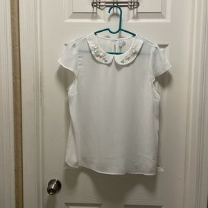 White blouse with beaded collar